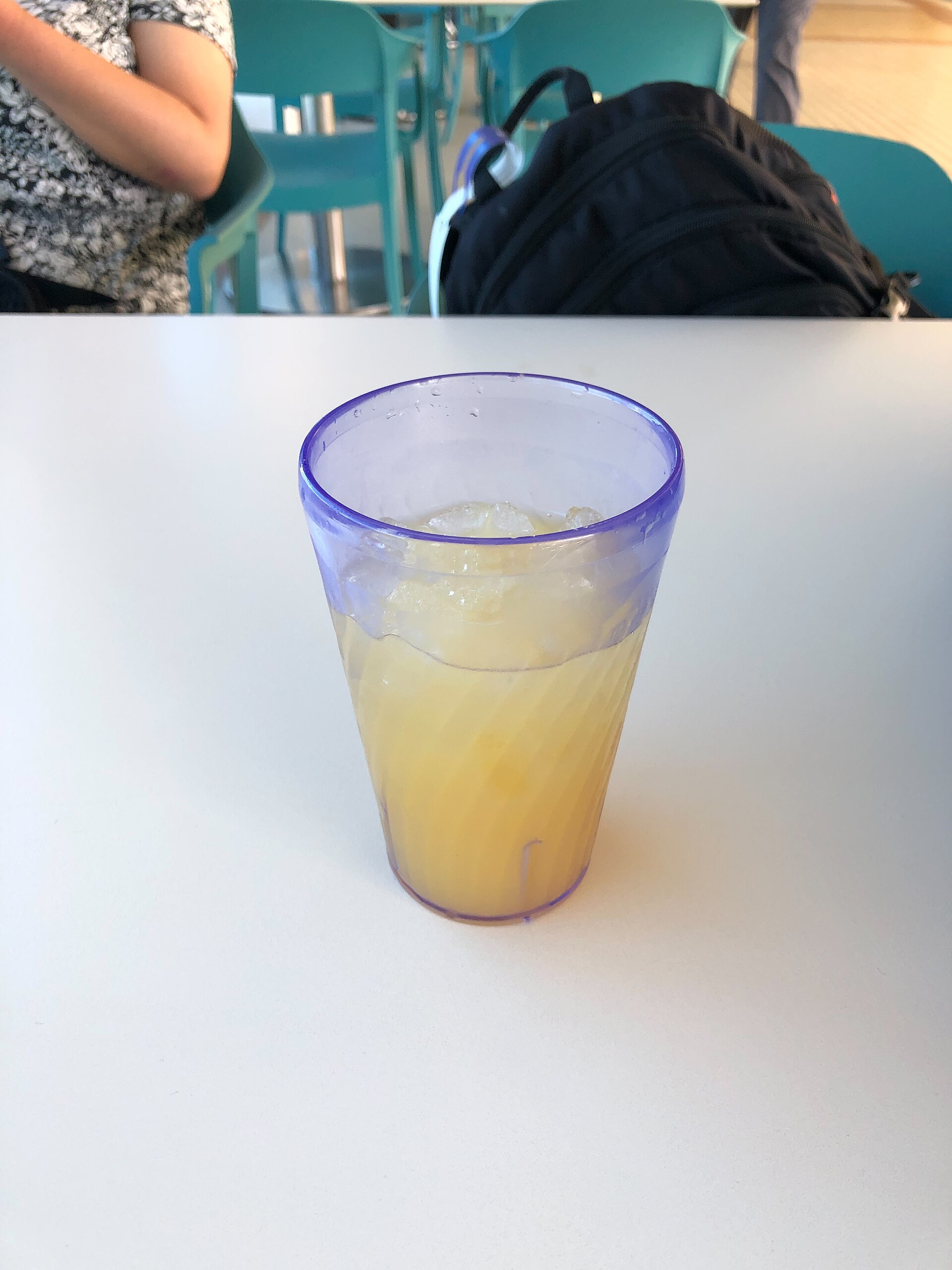 A glass of the orange juice and ice 'cortisol cocktail' that has been circulating on TikTok as a stress and cortisol lowering morning drink